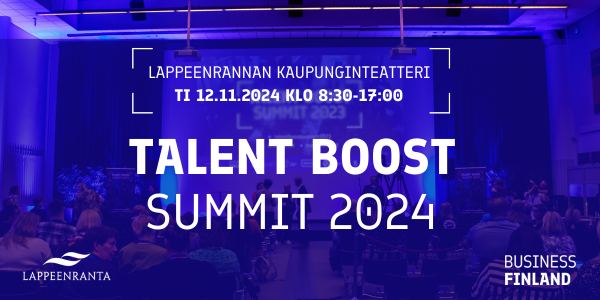 Sinertävä kuva luentosalista, jonka edessä lukee Talent Boost Summit 2024.